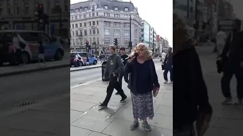 Dawn Martin preaching the good news at Oxford Circus, London.