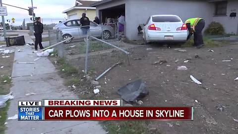 Car plows into Skyline-area home