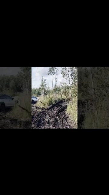 Idiot driver takes Subaru off-roading and gets stuck in mud