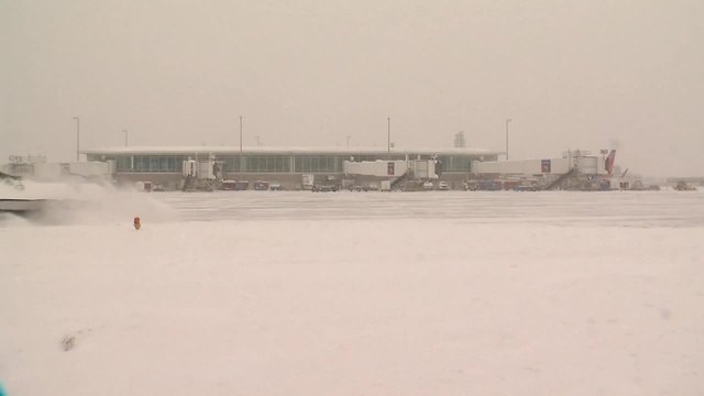 Airport crews working hard to clear runways