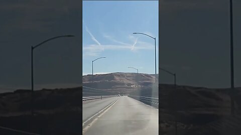 Driving across the Glen Canyon Dam bridge