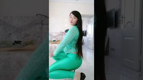 Chinese Girl Admires Herself