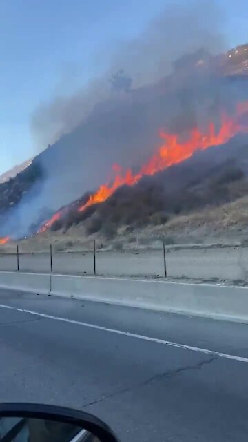 California wildfire rages right next to highway