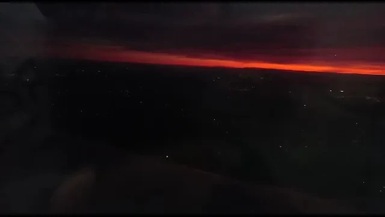 Sunset landing of A320 into Gatwick Airport, London, UK, Amazing view from the plane over wing.