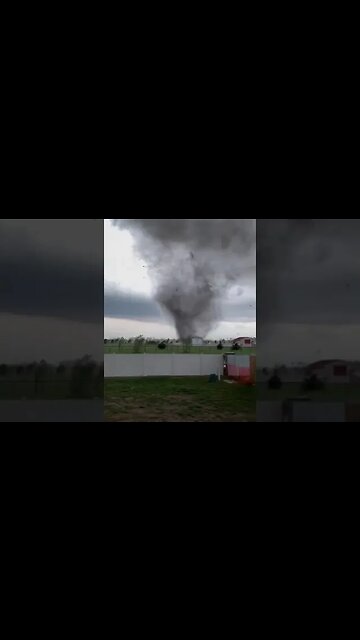 Man continues to film Andover Tornado right up untill it swallows his yard