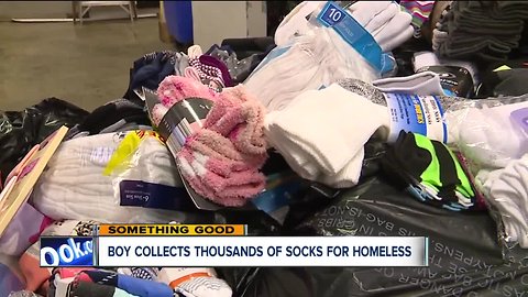7-year-old boy collects, delivers thousands of socks for homeless