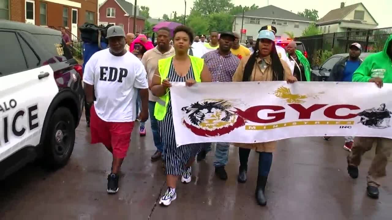 Community and police rally against gun violence together after violent weekend