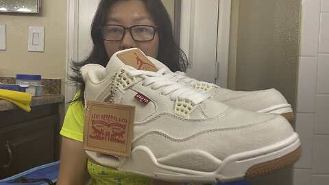 This is a pair FAKE Air Jordan 4 retro Levi’s shoes