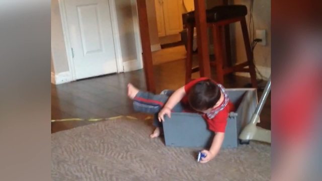 Kid Falls In A Box Full Of Toys