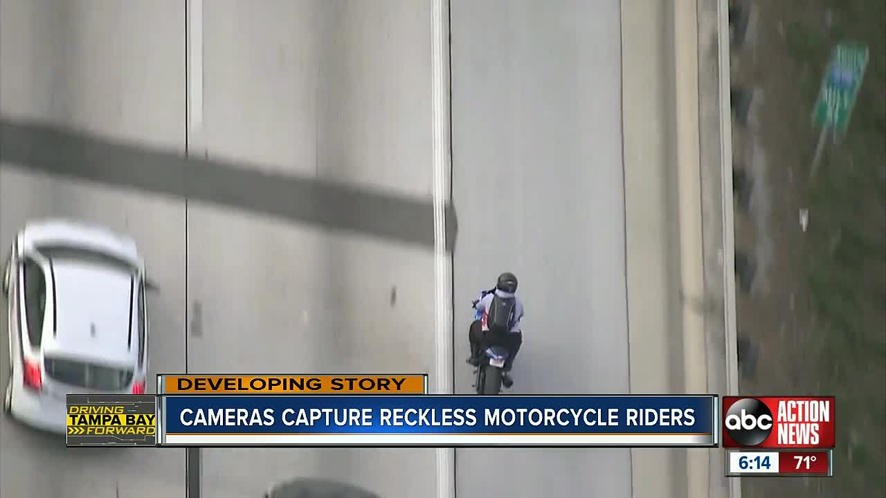 Dangerous motorcyclist caught on camera splitting lanes