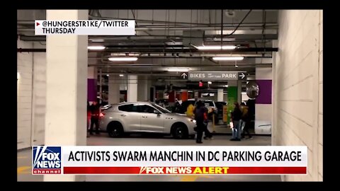 #FakeOutrage Left-Wing Activists Swarm Joe Manchin In DC Parking Garage