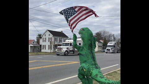 Prehistoric Patriot cheering on The People’s Convoy