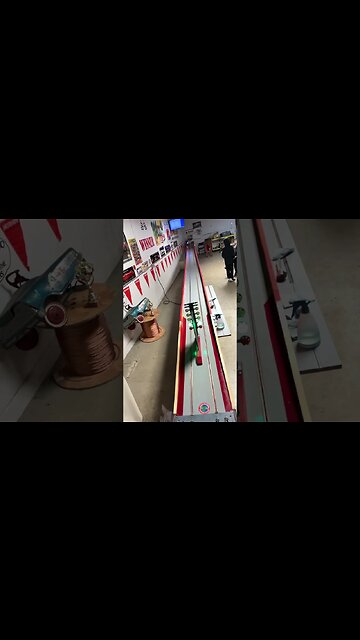 Bird’s Eye View of Slot Car Drags in SLO-Mo. cars get outa shape!