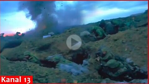 Combat image of Ukrainian fighters attacking trenches where Russians were hiding