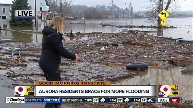 Ohio River floodwaters submerge Dearborn County road in trash and debris across roadway