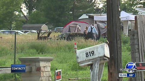 Neighbors in a Loveland neighborhood say several people are still living on a vacant property