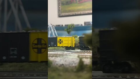 NA Dash9s pulling a hill