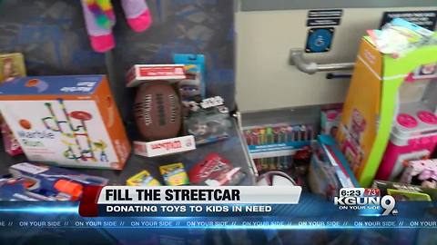 Stuff the streetcar event collects toys for kids in disadvantaged neighborhoods