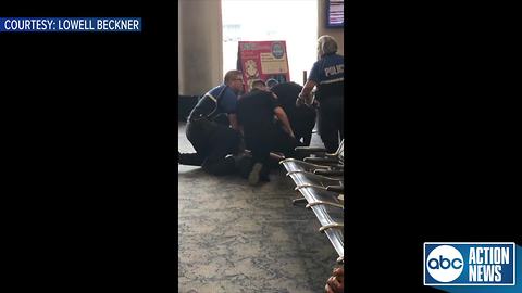 VIDEO: Unruly traveler arrested after making scene at TIA because of flight delay