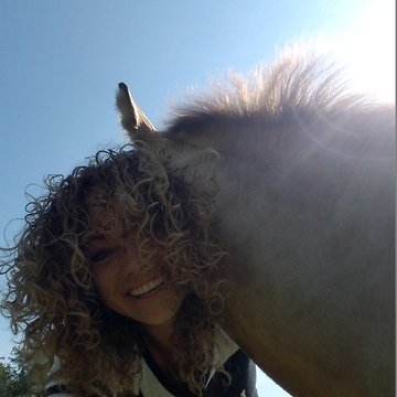 Foal giving human Momma hugs