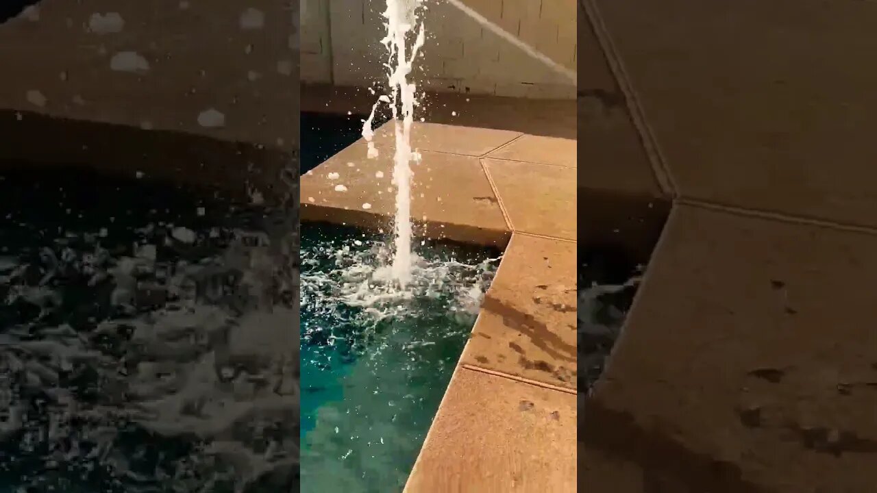 Powerful water jets in pool spilling into faulty grade around pool.