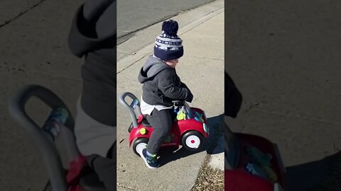 Toddler rolls car