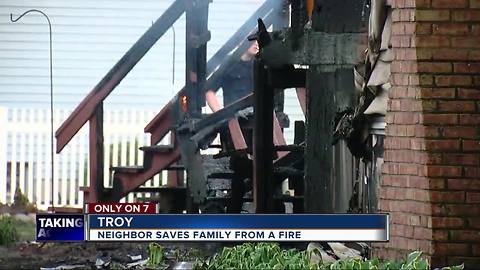 Troy family thanks neighbor for saving them from fire