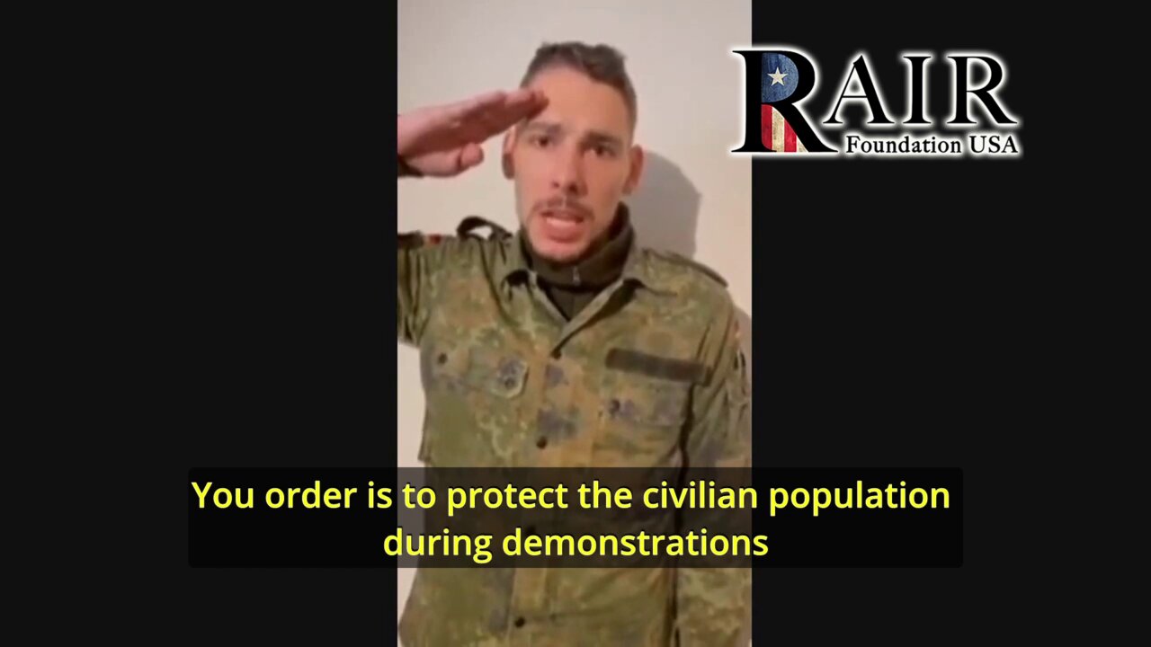 Germany: Serg. Maj. Andreas Oberauer orders his soldiers to protect demonstrators against police