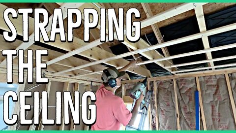 Installing Wall Insulation and Strapping in the Addition