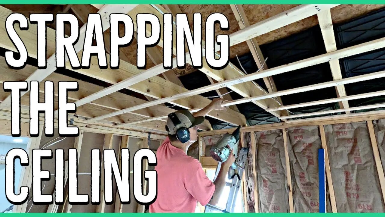 Installing Wall Insulation and Strapping in the Addition