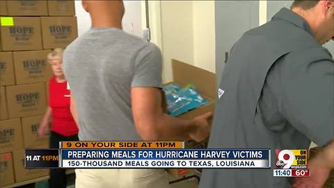 Volunteers make meal kits for Hurricane Harvey victims