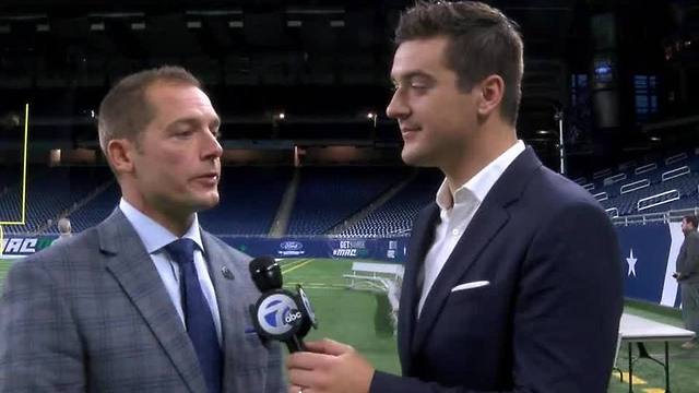 PJ Fleck talks with Brad Galli at Ford Field before Western Michigan's MAC Championship game