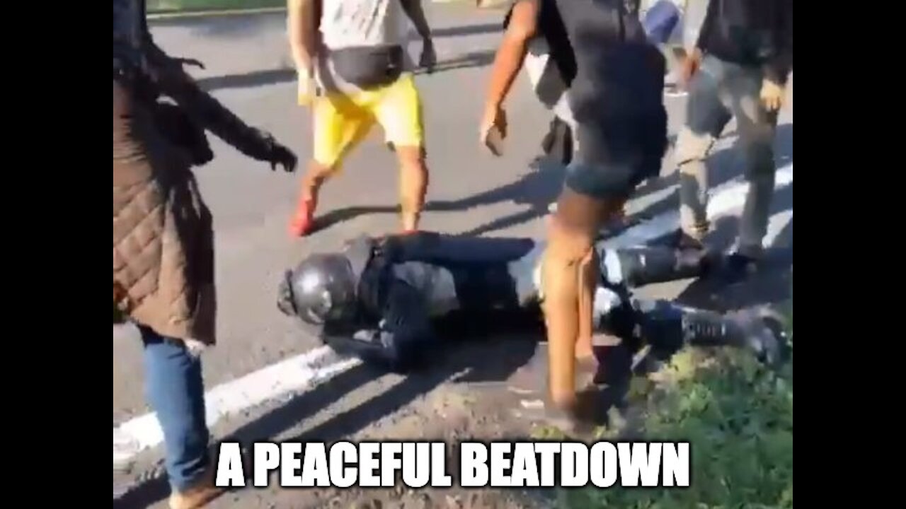 Peaceful Caravan Of Migrants Beat Mexican Cop Unconscious And Rob Him