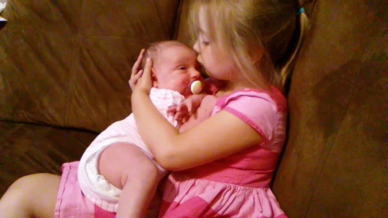 5-Year-Old Big sister gets newborn baby to sleep!