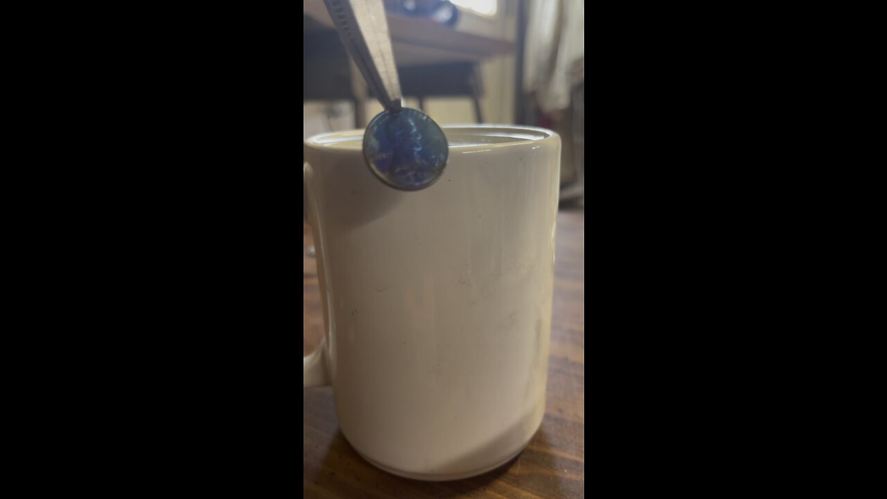 Blue copper Penny with water