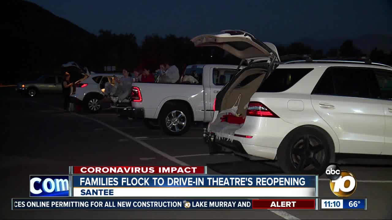 Families flock to drive-in theatre's reopening