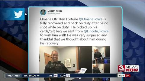 Omaha Police officer returns to duty after being shot last month