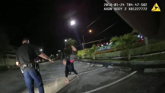 Police body camera video: Man attempts cartwheel during DUI test