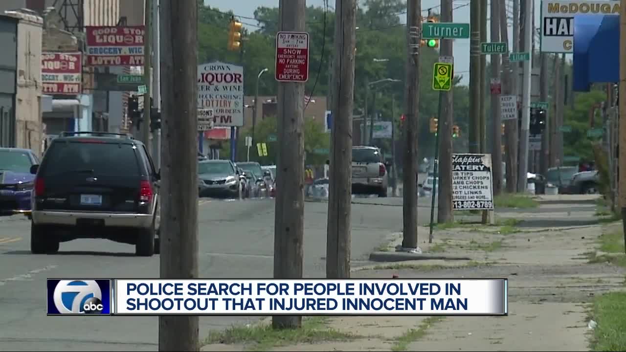 Dad shot after family caught in crossfire of Detroit gun battle