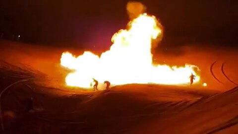 Some Geniuses Decided To Light Canisters Of Gasoline On The Beach, Doesn't Go Well For One Of Them