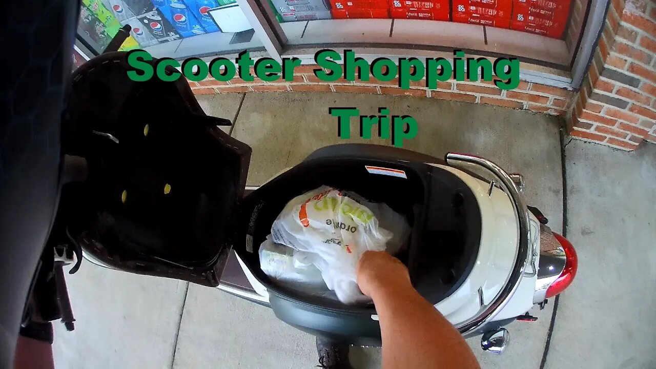 Using a scooter as it was intended: Storage and shopping.