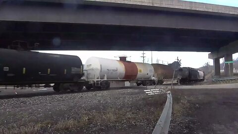 An intermodal/mix rolls west.