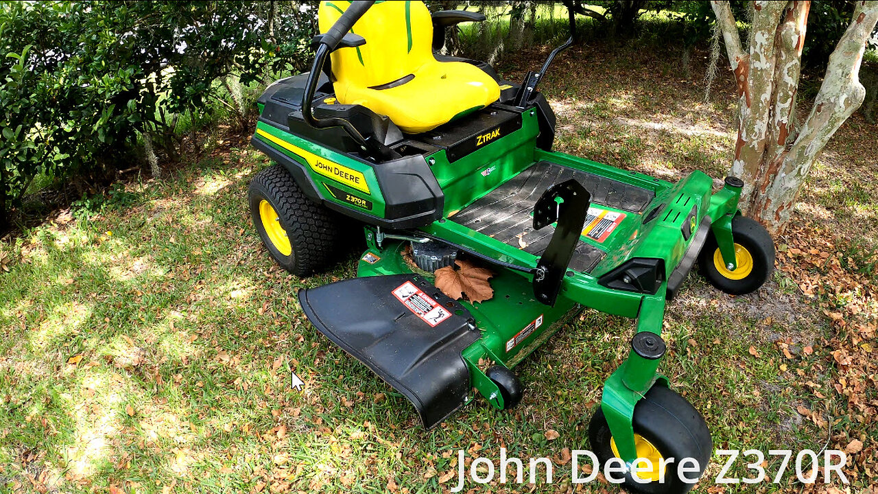 John Deere Z370R Electric Zero Turn Mower Cutting Thick Florida Grass