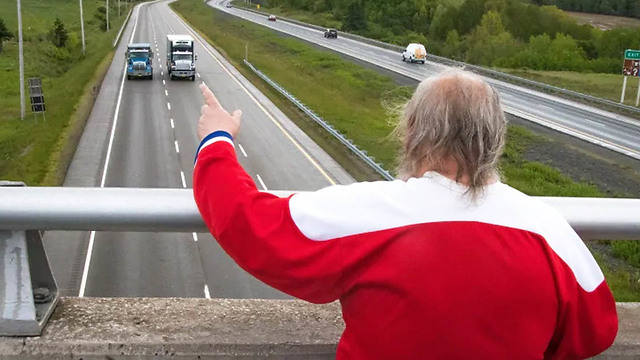 This Man Has Spent 48 Years Waving To Cars From A Highway Overpass