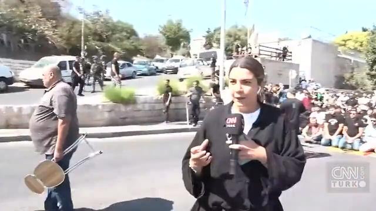 During CNN broadcast in Jerusalem, Israeli soldiers attack Muslims gathered for Friday prayers.