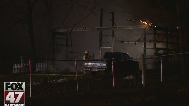 Heat lamp sparks Delta Township pole barn fire