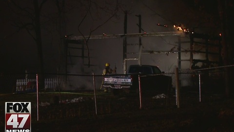 Heat lamp sparks Delta Township pole barn fire