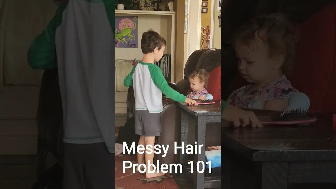 Brother fixes Baby sister's hair