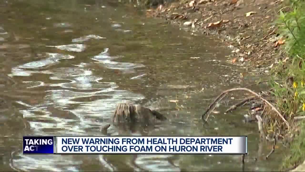 Michigan residents advised to avoid swallowing foam on Huron River