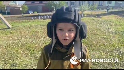 Aleksey, the boy from Belgorod Oblast who greets every passing Russian column got a token from Russian troops. It says, "thank you, Lesha"